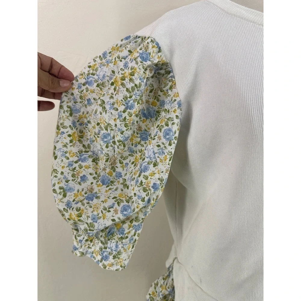 Anthropologie White Knit Top with Blue Floral Puff Sleeves